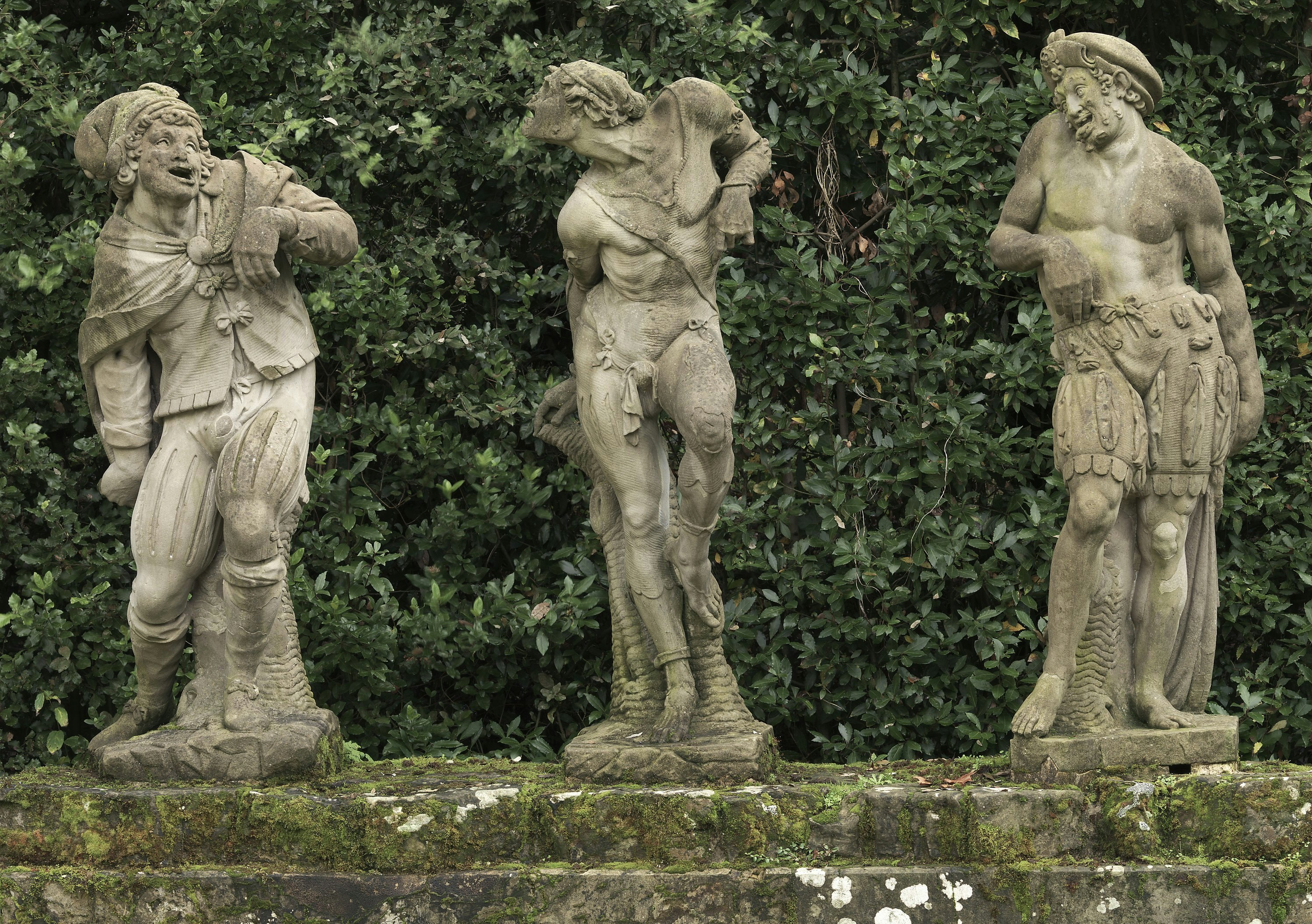 Three statues of Grotesque figures or Caramogi